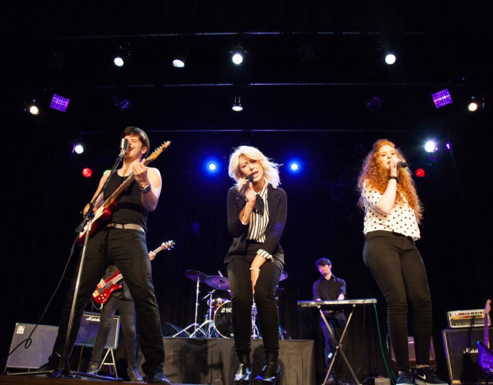 The Brotherhood live on stage